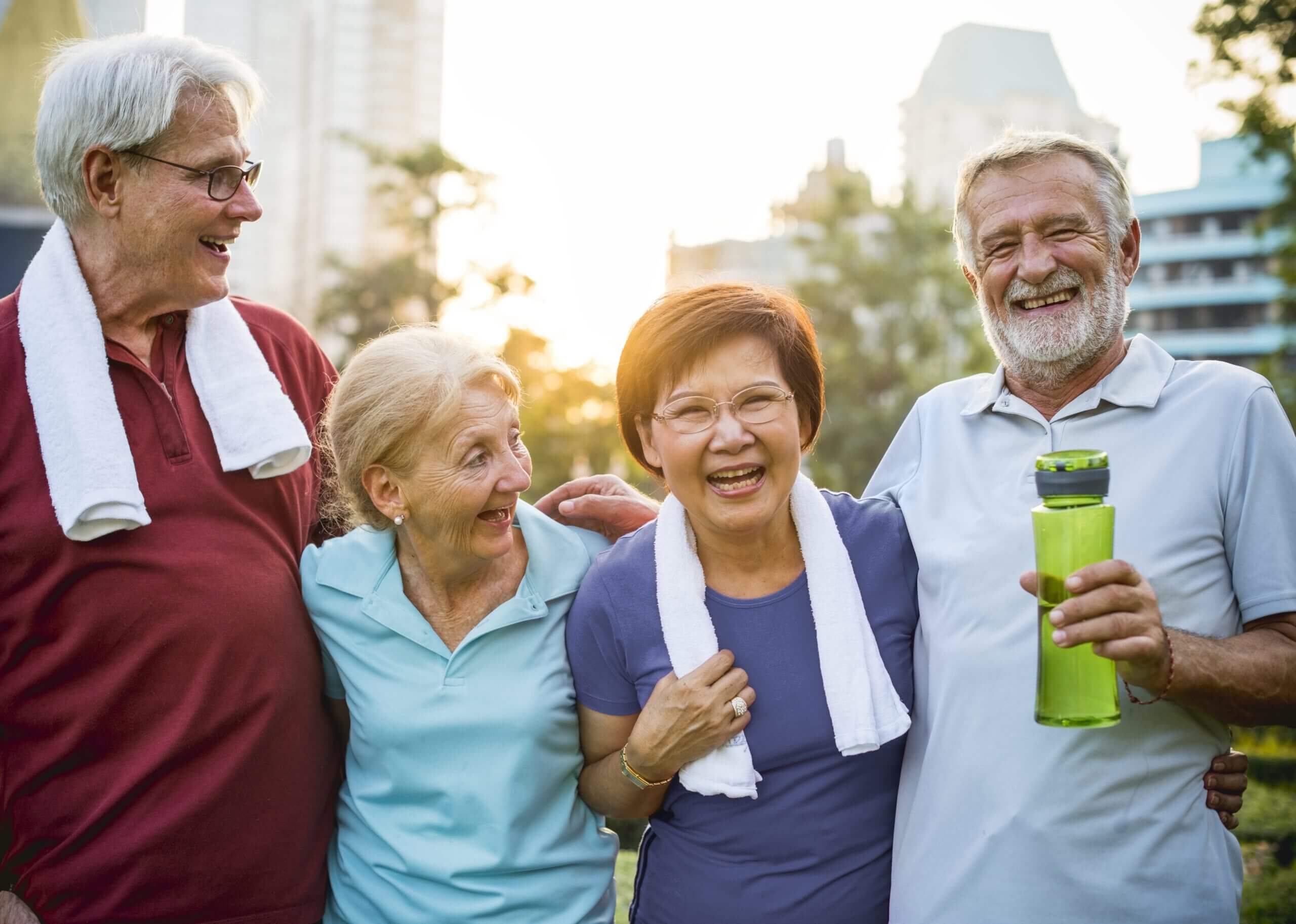 Group of diverse elderly exercise together